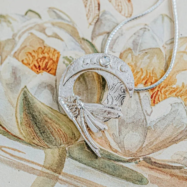 Artisan silver dragonfly and moon necklace with detailed textured design