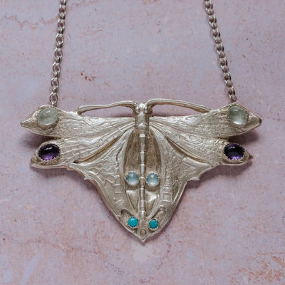 Art Nouveau inspired silver moth pendant necklace with amethyst, aquamarine and turquoise gemstones on silver chain, handmade statement jewellery.