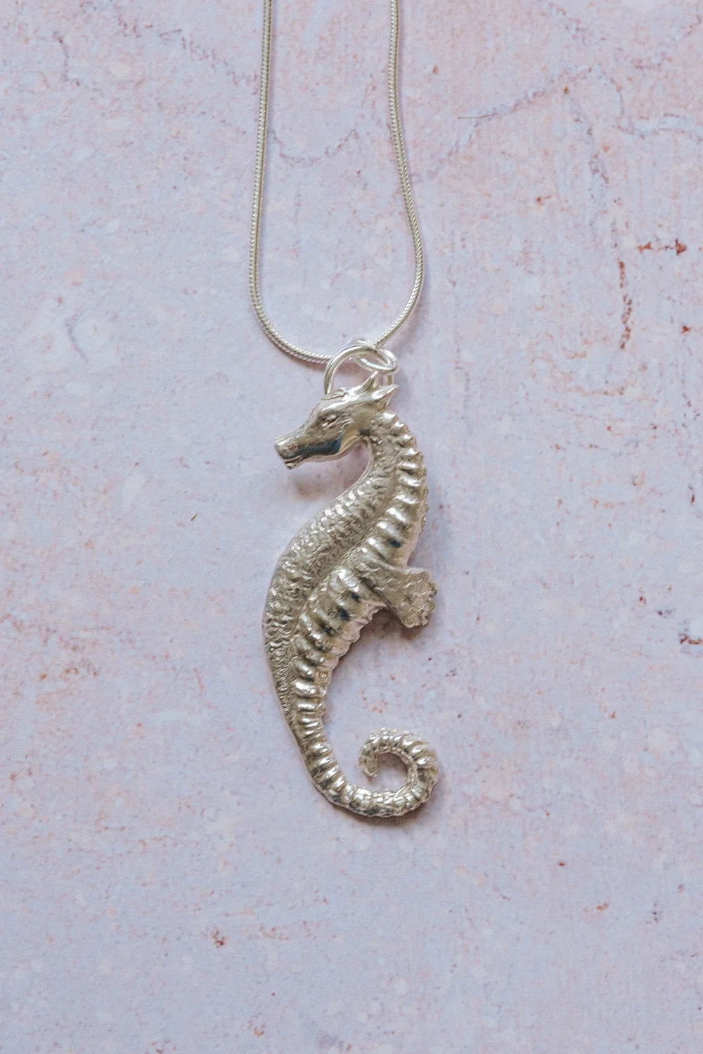 Handmade recycled fine silver seahorse pendant on 16 inch silver chain, detailed textured design
