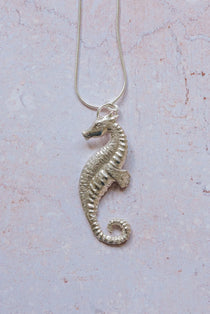 Handmade recycled fine silver seahorse pendant on 16 inch silver chain, detailed textured design