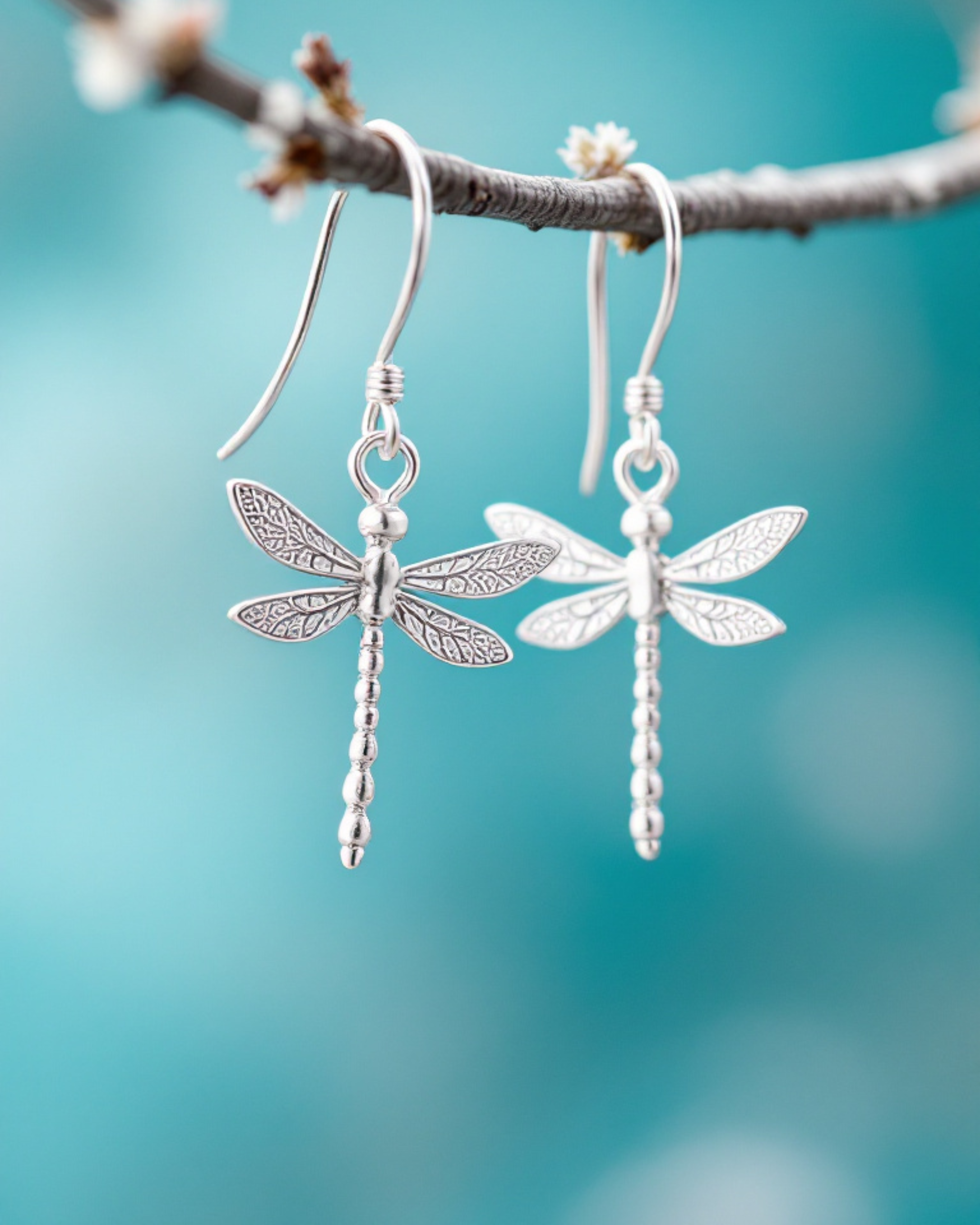 Handmade silver dragonfly earrings created in a silver clay jewellery workshop