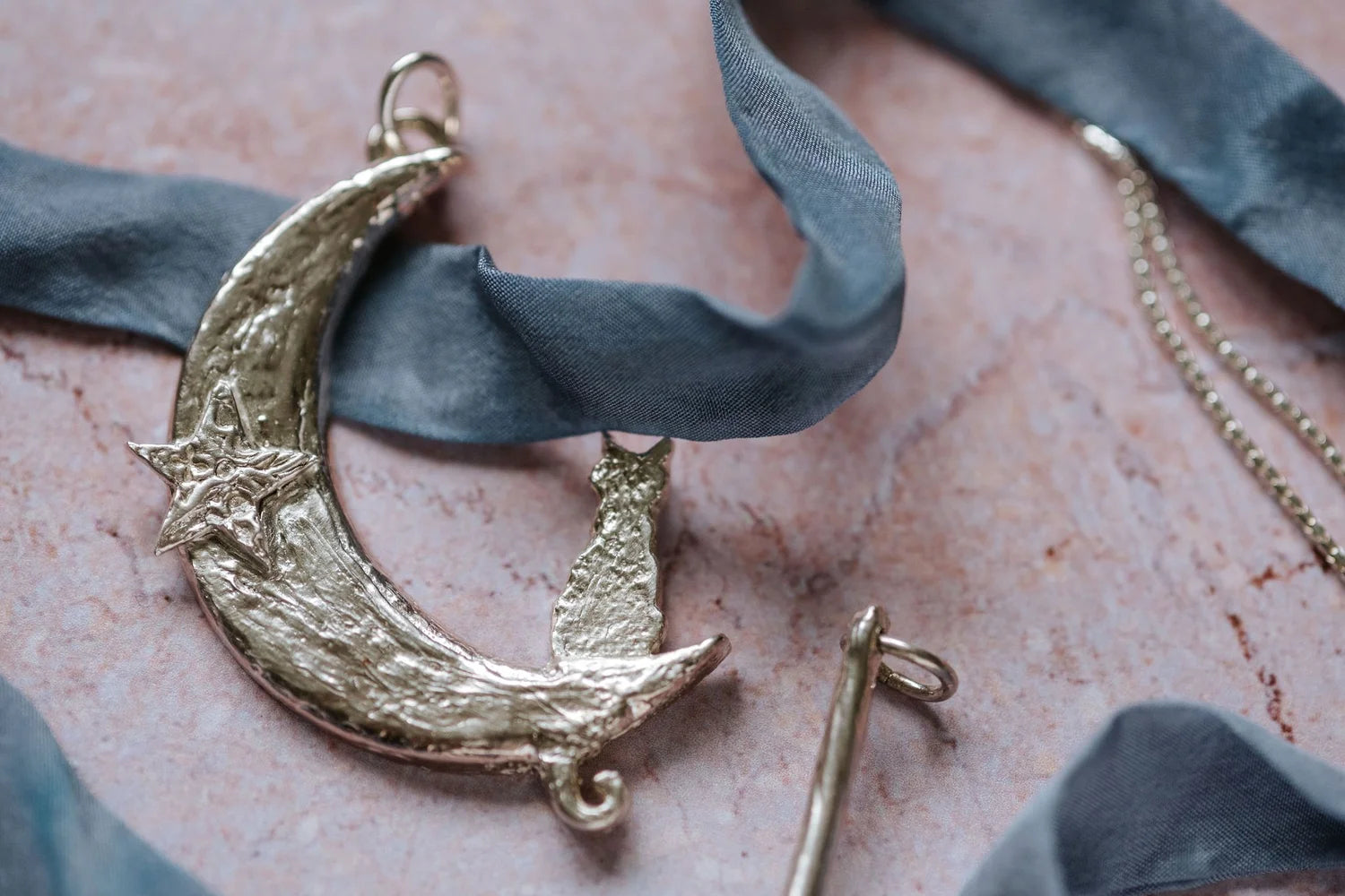 Crescent moon and cat silver pendant necklace with star design on chain