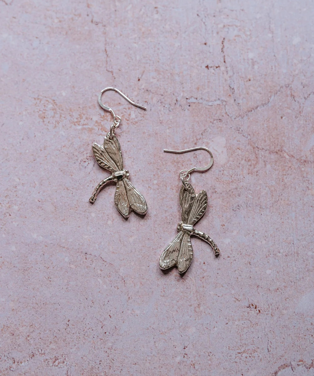 Handcrafted silver dragonfly dangle earrings, artisan nature-inspired jewellery made in the UK.