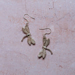 Handcrafted silver dragonfly dangle earrings, artisan nature-inspired jewellery made in the UK.