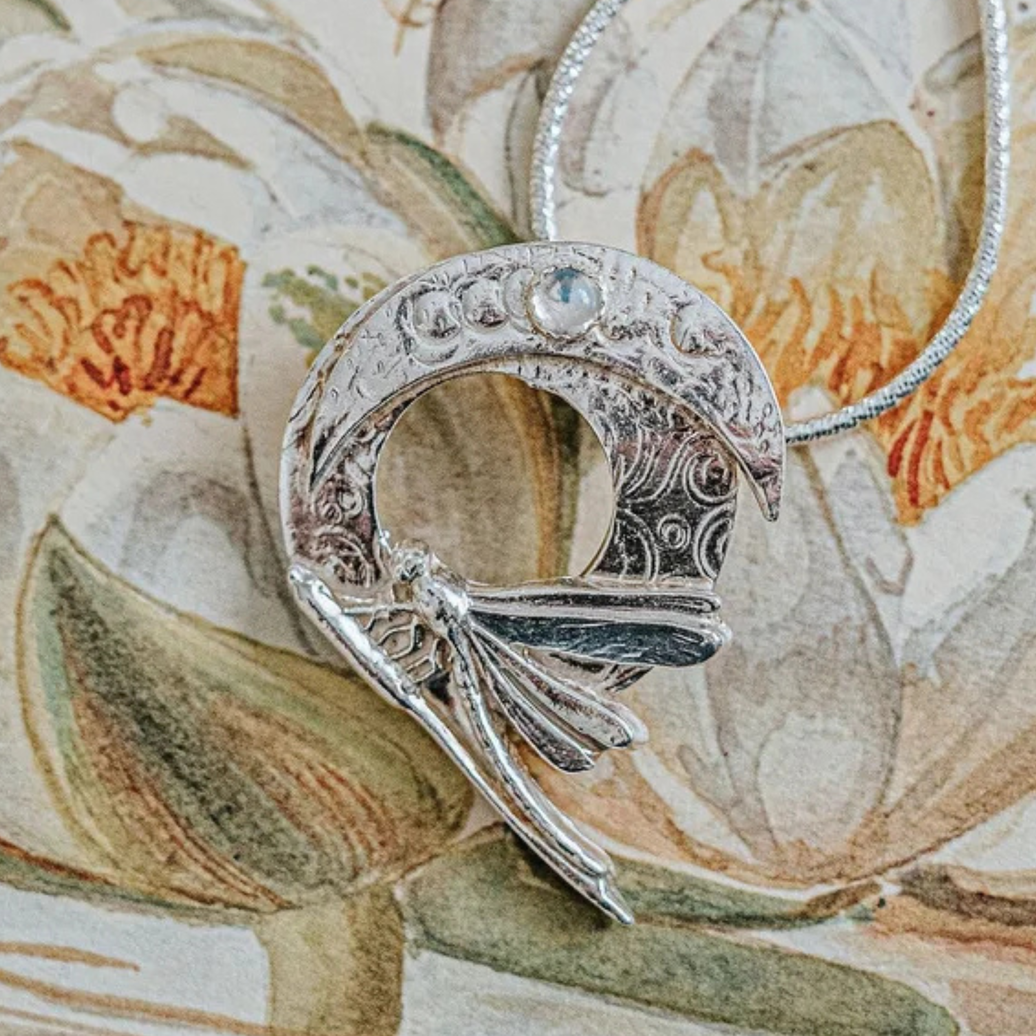 Handcrafted silver dragonfly and crescent moon pendant necklace with moonstone, inspired by Art Nouveau design.